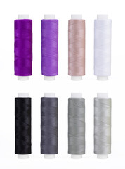 Set of sewing thread coils, miscellaneous colours, isolated on white