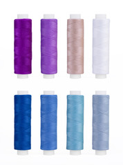 Set of sewing thread coils, miscellaneous colours, isolated on white
