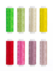 Set of sewing thread coils, miscellaneous colours, isolated on white