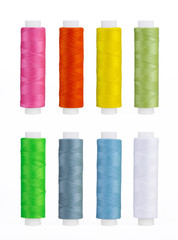 Set of sewing thread coils, miscellaneous colours, isolated on white