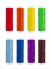 Set of sewing thread coils, miscellaneous colours, isolated on white