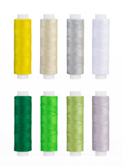 Set of sewing thread coils, miscellaneous colours, isolated on white