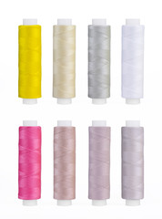 Set of sewing thread coils, miscellaneous colours, isolated on white
