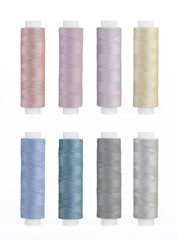 Set of sewing thread coils, miscellaneous colours, isolated on white