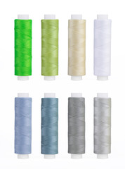 Set of sewing thread coils, miscellaneous colours, isolated on white