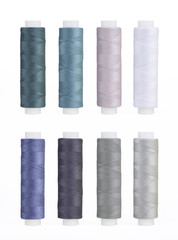 Set of sewing thread coils, miscellaneous colours, isolated on white