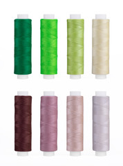 Set of sewing thread coils, miscellaneous colours, isolated on white