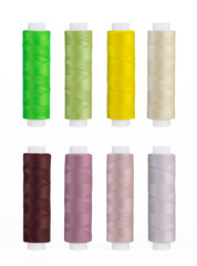 Set of sewing thread coils, miscellaneous colours, isolated on white