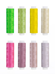 Set of sewing thread coils, miscellaneous colours, isolated on white