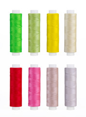 Set of sewing thread coils, miscellaneous colours, isolated on white