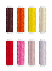 Set of sewing thread coils, miscellaneous colours, isolated on white