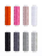 Set of sewing thread coils, miscellaneous colours, isolated on white