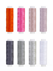 Set of sewing thread coils, miscellaneous colours, isolated on white