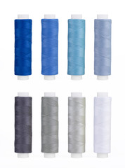 Set of sewing thread coils, miscellaneous colours, isolated on white