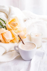 Morning romantic coffee served to bed with bunch of beige roses in shabby chic style interior, romantic bed breakfast or coffee