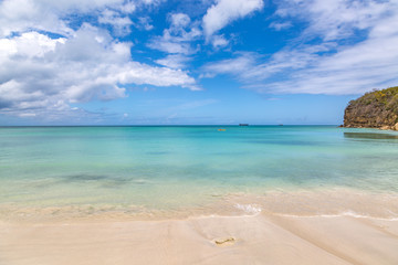 Fototapeta na wymiar Looking out to sea from an idyllic Antiguan beach