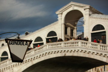 Fototapeta na wymiar Lantern indicating a Gondola Rental Stop at the famous Rialto Bridge in Venice, Italy