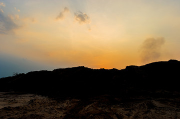 Mountain silhouette The sun, the sky and the life Silhouette concept