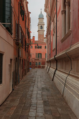 Fototapeta na wymiar Narrow Walkway in the City Center of Venice,Italy - No People