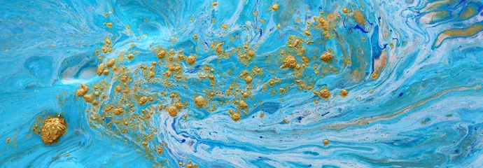 Abstrakter marmorierter Effekthintergrund. Blaue kreative Farben. Schöne Farbe mit dem Zusatz von Gold. Banner © tomertu