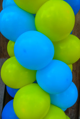 Blue and yellow inflatable balls in the form of a spiral.