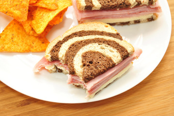 Eating a Ham & Cheese Sandwich on Rye & Pumpernickel Bread 