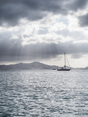 Sail boat in the tropical bay