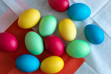 Fototapeta na wymiar colored multi-colored eggs, top view