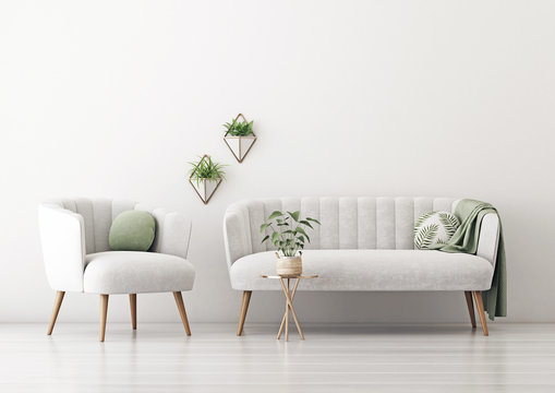 Living room interior wall mockup with gray velvet sofa and armchair, round pillow with tropical pattern, green plaid and plants on empty white wall background. 3D rendering, illustration.