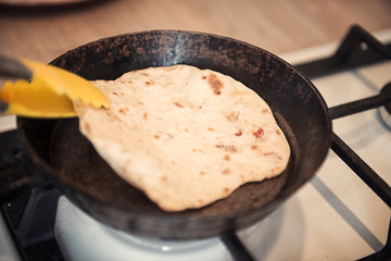 Greek pita bread on the old skillet