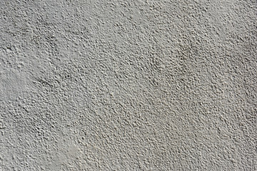 white plastered and painted concrete wall