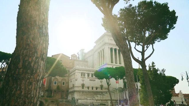 Beautiful panorama of a Vittoriano with a flag of Italy. Slow motion