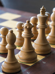 wood chess pieces on board game, sport
