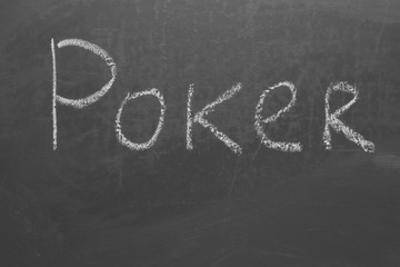 Obraz premium Handwritten chalk poker inscription on gray board