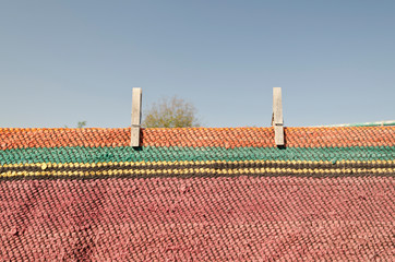 Cleaning and hand washing the rugs in the village