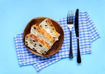 Appetizing cottage cheese casserole with raisins, close up