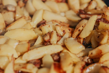 Roasted Golden Potatoes on a rustic wooden background.