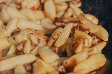 Roasted Golden Potatoes on a rustic wooden background.