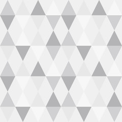 ..Triangles background. Vector geometric seamless pattern in pastel retro colors and textured simple shapes.
