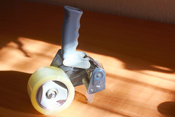  Dispenser for adhesive tape on the worktable