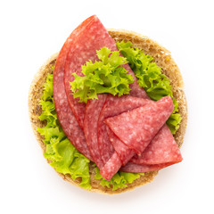 Sandwich with salami sausage on white background.