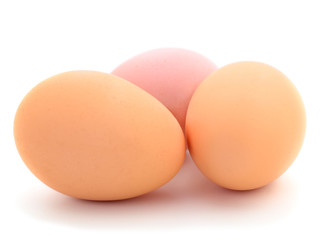 Three chicken eggs.