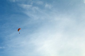 kite flying in the sky,motorized paraglider, fly, paragliding, blue, flying, sport, air,  adventure, extreme, freedom, 