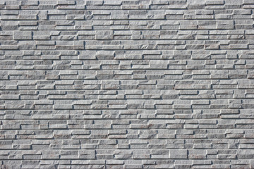 modern masonry gray brick tile surface texture design wall background.