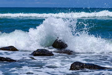 Fototapeta premium Blue sky and white waves at Koh Mak, Thailand