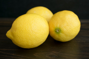 Lemons on a Dark Wood Background
