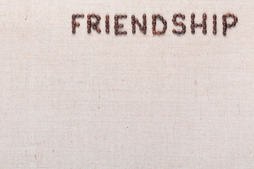 Friendship word written with coffee beans, aligned at the top right.
