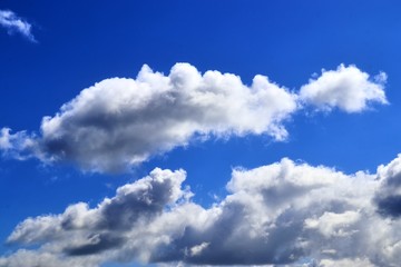 Beautiful white cloud formations in a deep blue sky on a sunny day
