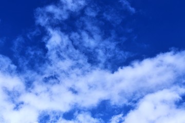 Beautiful white cloud formations in a deep blue sky on a sunny day