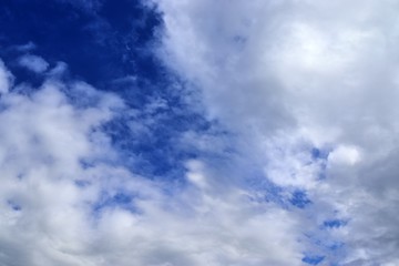 Beautiful white cloud formations in a deep blue sky on a sunny day